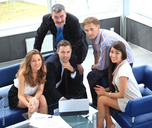 Photo: business team in business meeting business team in business meeting