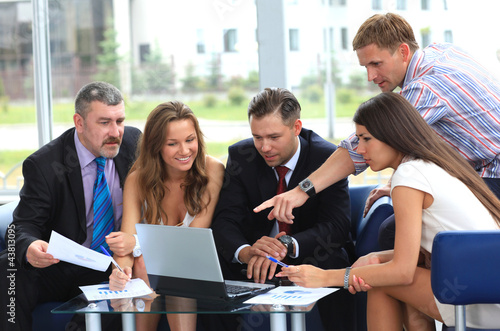 Photo: Business team in business meeting Business team in business meeting