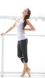 Photo: Healthy woman in fitness clothing Healthy woman in fitness clothing
