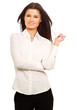 Portrait of a smiling young woman pointing up