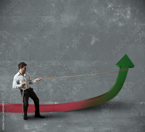Foto: Businessman changes statistics Businessman changes statistics