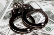 Dollars and handcuffs