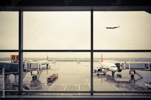 Photo: airport outside the window scene airport outside the window scene