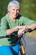 Foto: mature woman with bicycle mature woman with bicycle
