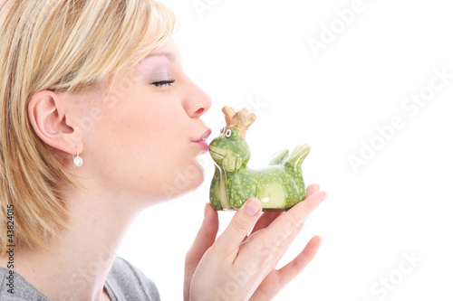 Photo: Woman kissing her frog prince Woman kissing her frog prince