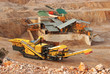 yellow career excavator in a quarry