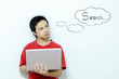 Asian man with laptop and question word in comics bubble