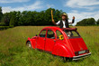 French man with his typical red car