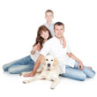 Foto: A young family with a dog A young family with a dog