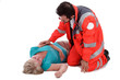 Photo: Rettungssanitäter betreut eine Patientin Rettungssanitäter betreut eine Patientin