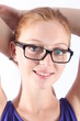 Beautiful redhead young woman posing to the camera