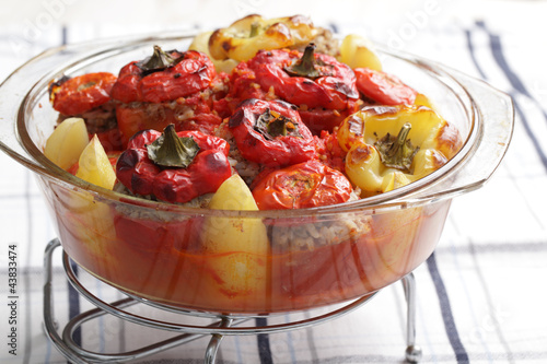 Photo: Stuffed tomatoes and peppers in the glass casserole Stuffed tomatoes and peppers in the glass casserole