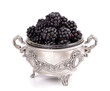 fresh blackberry  in a metal bowl  Isolated