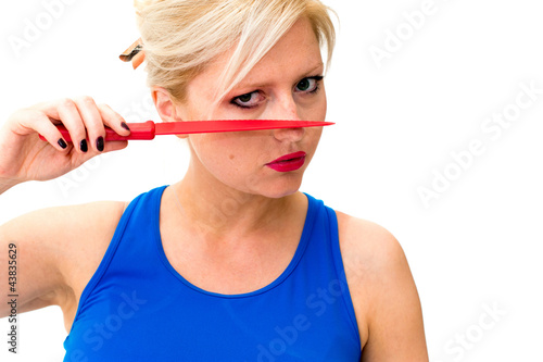 Foto: woman is holding a knife woman is holding a knife