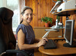 Middle-aged woman at computer
