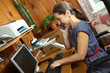 woman working at  computer