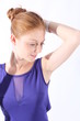 Beautiful redhead young woman posing to the camera