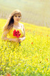 girl with bouquet of poppies