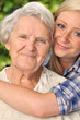 Grandmother and granddaughter.