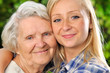 Grandmother and granddaughter.