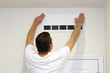 Photo: Man Covering Air Vent Man Covering Air Vent
