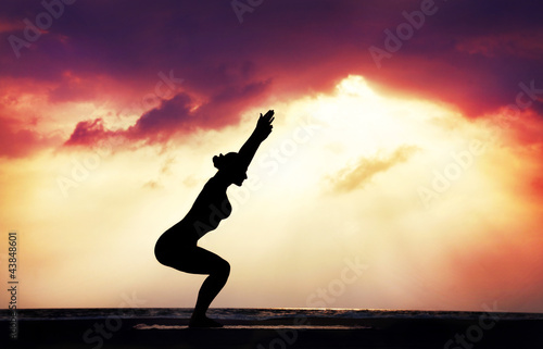 Photo: Yoga silhouette on the beach Yoga silhouette on the beach