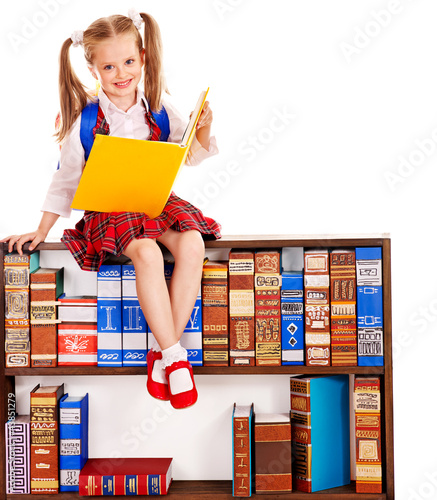 Photo: Child with stack book. Child with stack book.