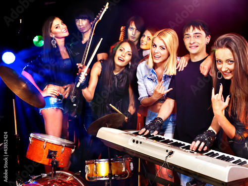Photo: Band playing musical instrument. Band playing musical instrument.