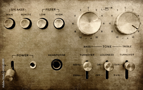Photo: Grunge old amplifier close up Grunge old amplifier close up