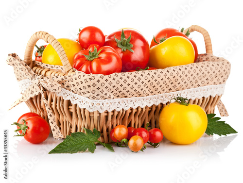 Photo: fresh tomatoes in the basket fresh tomatoes in the basket