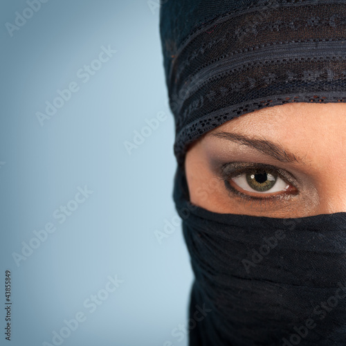 Photo: Portrait of veiled woman, focus on eyes. Portrait of veiled woman, focus on eyes.