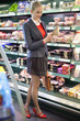 Woman shopping in a supermarket