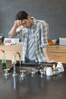 Man looking tired after washing dishes