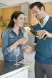Couple drinking wine in the kitchen