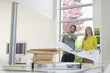 Interior designer discussing plan with a woman