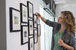 Interior designer measuring painting size
