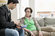 Male doctor explaining about medicines to a patient