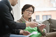 Male doctor giving medicine to a patient
