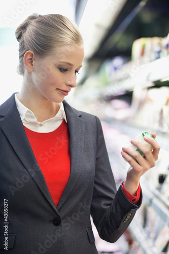 Photo: Woman shopping in a supermarket Woman shopping in a supermarket