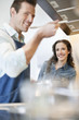 Couple tasting the food