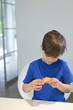 Boy holding a cup cake