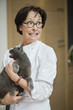 Woman holding a cat