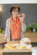 Woman eating bread