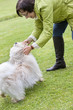 Woman playing with her dog