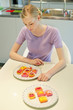 Woman with cup cakes