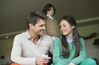 Man sitting with his daughter at home