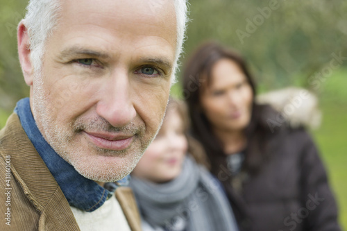 Photo: Portrait of a man with his family Portrait of a man with his family
