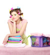Photo: beautiful young housewife with basket of folded laundry beautiful young housewife with basket of folded laundry