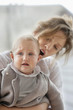 Woman consoling her crying baby