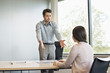 Business executive discussing with his client